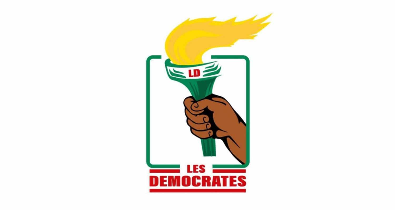 Dessin stylisé d une main tenant une torche allumée avec les lettres LD et le texte Les Democrates en dessous